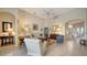 Inviting living room with comfortable seating, tiled floor, and high ceilings at 92 Tall Trees Ct, Sarasota, FL 34232