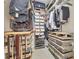 Organized walk-in closet with custom shelving, drawers, and ample space for storing clothes and shoes at 1359 Tearose Pl, Sarasota, FL 34239