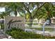 View of the Mandarin Park gated community entrance with landscaping at 1359 Tearose Pl, Sarasota, FL 34239