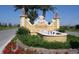 Venetian Golf & River Club entrance sign with water feature, manicured landscaping and regal lion statues at 273 Portofino Dr, North Venice, FL 34275