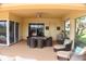 Enjoy outdoor living on this expansive lanai with dining, kitchen, and seating areas at 273 Portofino Dr, North Venice, FL 34275