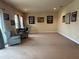 Large living room with decorative baseball memorabilia at 273 Portofino Dr, North Venice, FL 34275