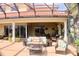 Outdoor patio area perfect for relaxing or entertaining with seating at 273 Portofino Dr, North Venice, FL 34275