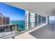 Expansive balcony offering stunning waterfront views of the city and ocean at 301 Quay Commons # 1411, Sarasota, FL 34236