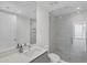 Modern bathroom with a large walk-in shower and stylish vanity at 301 Quay Commons # 1411, Sarasota, FL 34236