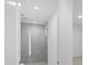 Modern bathroom with glass shower and sleek design, featuring white walls at 301 Quay Commons # 1411, Sarasota, FL 34236