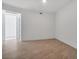 Bright and airy bedroom with tile flooring and a view of a modern hallway at 301 Quay Commons # 1411, Sarasota, FL 34236