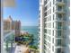 Expansive views of the water and surrounding cityscape from the balcony showcasing waterfront living and city skyline at 301 Quay Commons # 1411, Sarasota, FL 34236
