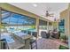 Outdoor bar adjacent to the screened pool and covered lanai at 3336 Lakeside Cir, Parrish, FL 34219