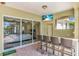 Bar seating right off the patio with views of the pool and lakeside at 3336 Lakeside Cir, Parrish, FL 34219