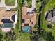 Screened-in swimming pool and a lake view at 3336 Lakeside Cir, Parrish, FL 34219