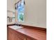 Functional utility sink area with ample counter space and cabinet storage, perfect for various tasks at 3336 Lakeside Cir, Parrish, FL 34219