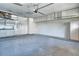 Clean and organized garage featuring white cabinetry along the walls, offering ample storage space at 3814 Mira Lago Dr, Sarasota, FL 34238