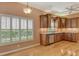 Eat in kitchen features stainless steel appliances, great view, and lots of storage at 3814 Mira Lago Dr, Sarasota, FL 34238