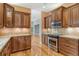 Gourmet kitchen features stainless steel appliances and granite countertops, great location at 3814 Mira Lago Dr, Sarasota, FL 34238