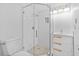 Modern bathroom with glass-enclosed shower, and a sleek vanity with ample storage at 4126 Heron Way # B113, Bradenton, FL 34205
