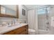 Classic bathroom featuring a shower-tub combination with a wooden vanity and ample counter space at 4320 Falmouth Dr # 301, Longboat Key, FL 34228