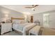 Inviting main bedroom showcasing a king-size bed, walk-in closet, and ensuite bathroom access at 4320 Falmouth Dr # 301, Longboat Key, FL 34228