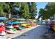 Assortment of colorful kayaks and canoes lined up and ready for residents to enjoy at 4320 Falmouth Dr # 301, Longboat Key, FL 34228