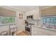 Updated kitchen with stainless appliances, white cabinetry and great natural light at 4320 Falmouth Dr # 301, Longboat Key, FL 34228