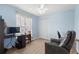 Comfortable bedroom with neutral walls, wood-look flooring, and closet at 5388 Pamela Wood Way # 8, Sarasota, FL 34233