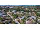 Charming coastal home with lush greenery, close to the beach and the calm lake waters at 651 Fox St, Longboat Key, FL 34228