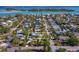 Aerial view of the property, showing the landscaping, proximity to nearby homes and the quiet neighborhood at 651 Fox St, Longboat Key, FL 34228