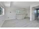 Open loft area featuring a window and modern railing at 651 Fox St, Longboat Key, FL 34228
