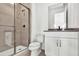Bathroom featuring tiled shower, vanity, and modern fixtures at 17903 Palmiste Dr, Bradenton, FL 34202