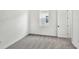 Bedroom showcasing neutral carpet, white trim, and a window at 17903 Palmiste Dr, Bradenton, FL 34202