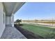 Scenic view from covered patio overlooking a serene pond at 17903 Palmiste Dr, Bradenton, FL 34202