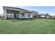 Spacious backyard features a well-maintained lawn and mature landscaping at 17915 Palmiste Dr, Bradenton, FL 34202