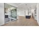 Spacious living room with view to outdoor kitchen and open concept kitchen at 17915 Palmiste Dr, Bradenton, FL 34202