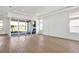 Bright living room with a view of lake and outdoor kitchen at 17915 Palmiste Dr, Bradenton, FL 34202