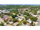 Stunning aerial view of the surrounding area with the subject house showcasing installed solar panels at 2822 Maple Ave, Sarasota, FL 34234