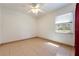 Bright bedroom with tile flooring and a window offering natural light at 2822 Maple Ave, Sarasota, FL 34234