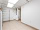 Bright storage room with tiled floors and shelving unit at 2822 Maple Ave, Sarasota, FL 34234