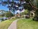 A tranquil community featuring a gazebo by the lake and fountain at 315 30Th W Ave # 101B, Bradenton, FL 34205