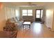 Bright living room featuring neutral colors, plush seating, and a ceiling fan, creating a comfortable and inviting space at 315 30Th W Ave # 101B, Bradenton, FL 34205