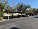 Assigned parking for residents under a covered structure at 315 30Th W Ave # 101B, Bradenton, FL 34205