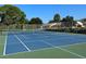 Well maintained tennis court with green and blue surface at 315 30Th W Ave # 101B, Bradenton, FL 34205
