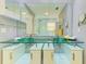 Modern bathroom featuring stylish double sinks with vessel bowls and ample counter space at 4147 Augustine Ave, Sarasota, FL 34231