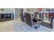 Elegant dining area with modern decor and seamless flow into other living spaces at 4147 Augustine Ave, Sarasota, FL 34231