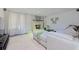 Bright living room with a cozy brick fireplace and comfortable seating area at 4147 Augustine Ave, Sarasota, FL 34231