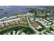 Aerial view of a waterfront community with resort style amenities, bay access and manicured grounds at 4722 Independence Dr, Bradenton, FL 34210