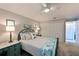 Cozy bedroom with a large closet, marine-themed decor, and a tranquil view from the window at 4722 Independence Dr, Bradenton, FL 34210