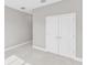 Spacious bedroom with a closet and a smooth, neutral color palette for versatility at 514 Santiguay St, Punta Gorda, FL 33983