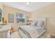 Serene bedroom with soft lighting and a cozy atmosphere is perfect for relaxation at 7812 Birdie Bend Way, Sarasota, FL 34241