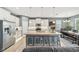 Spacious kitchen boasts a large island, stainless steel appliances, and lots of storage at 7812 Birdie Bend Way, Sarasota, FL 34241
