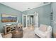Comfortable office area featuring neutral walls and trim, carpeted floors and lots of sunlight at 7812 Birdie Bend Way, Sarasota, FL 34241